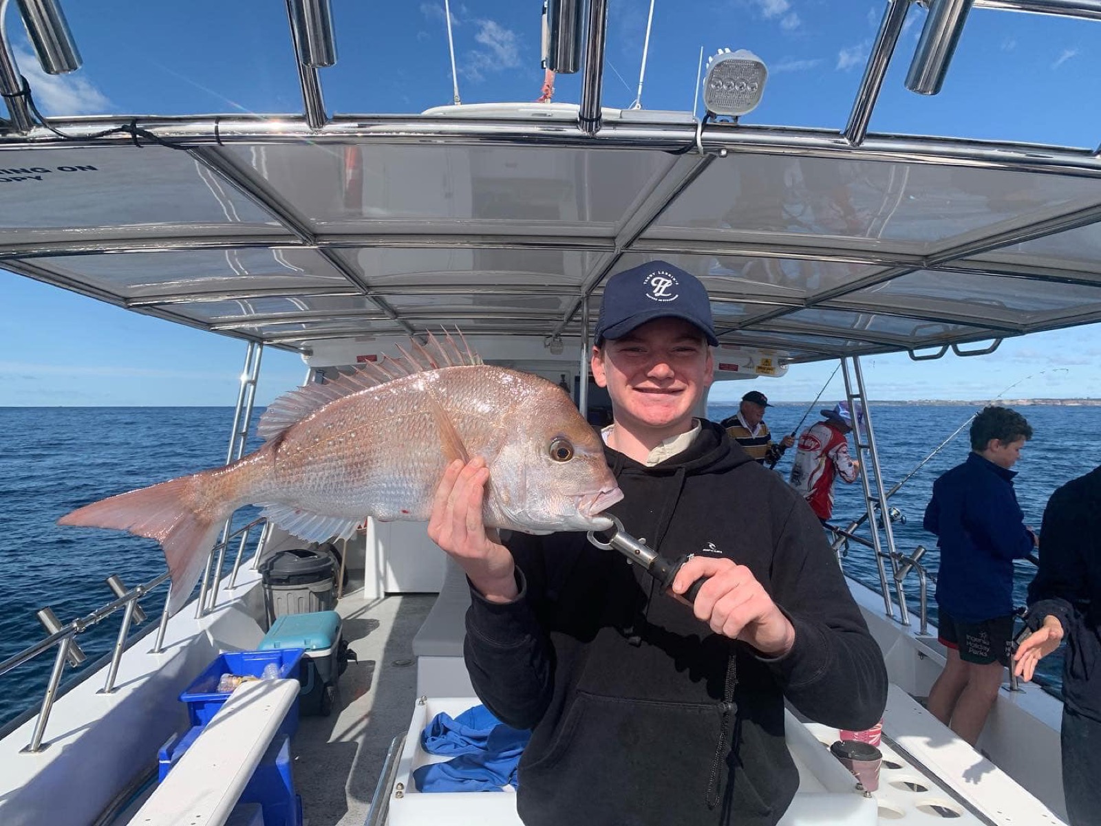 A jewfish brought over the side